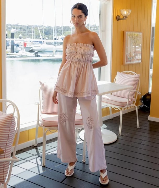 a lady wearing a pale pink top and pants set SNDYS Ines Top,and Ines Pants Set