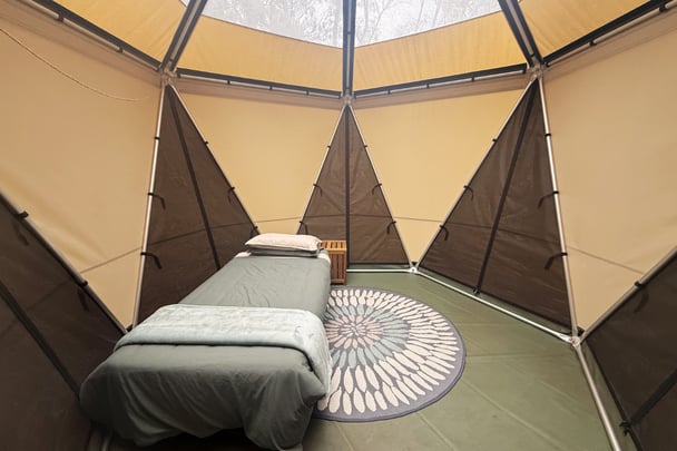 Inside the solo pod with transparent roof for stargazing.