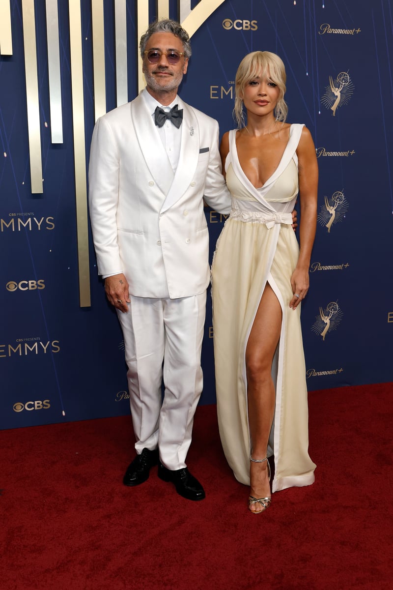 Taika Waititi and Rita Ora attend the 77th Primetime Emmy Awards at Peacock Theater.