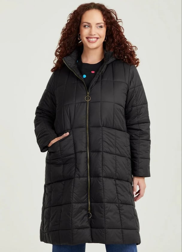 woman wearing black puffer jacket from Taking Shape