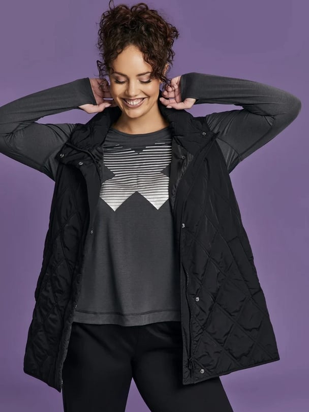 woman wearing puffer vest