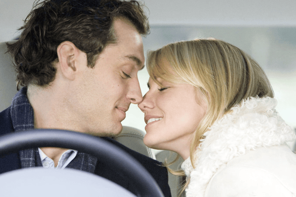 Iris and Graham kiss in the car in The Holiday movie.