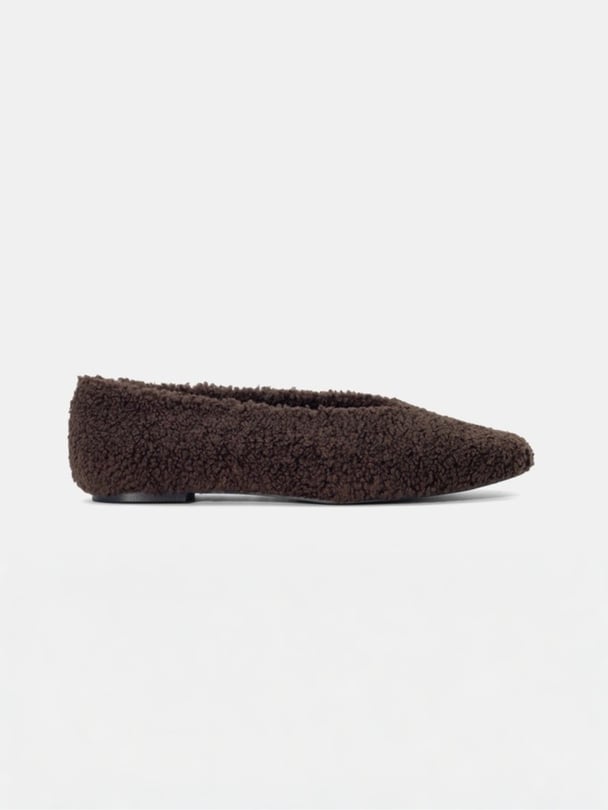  Brown fluffy flats.