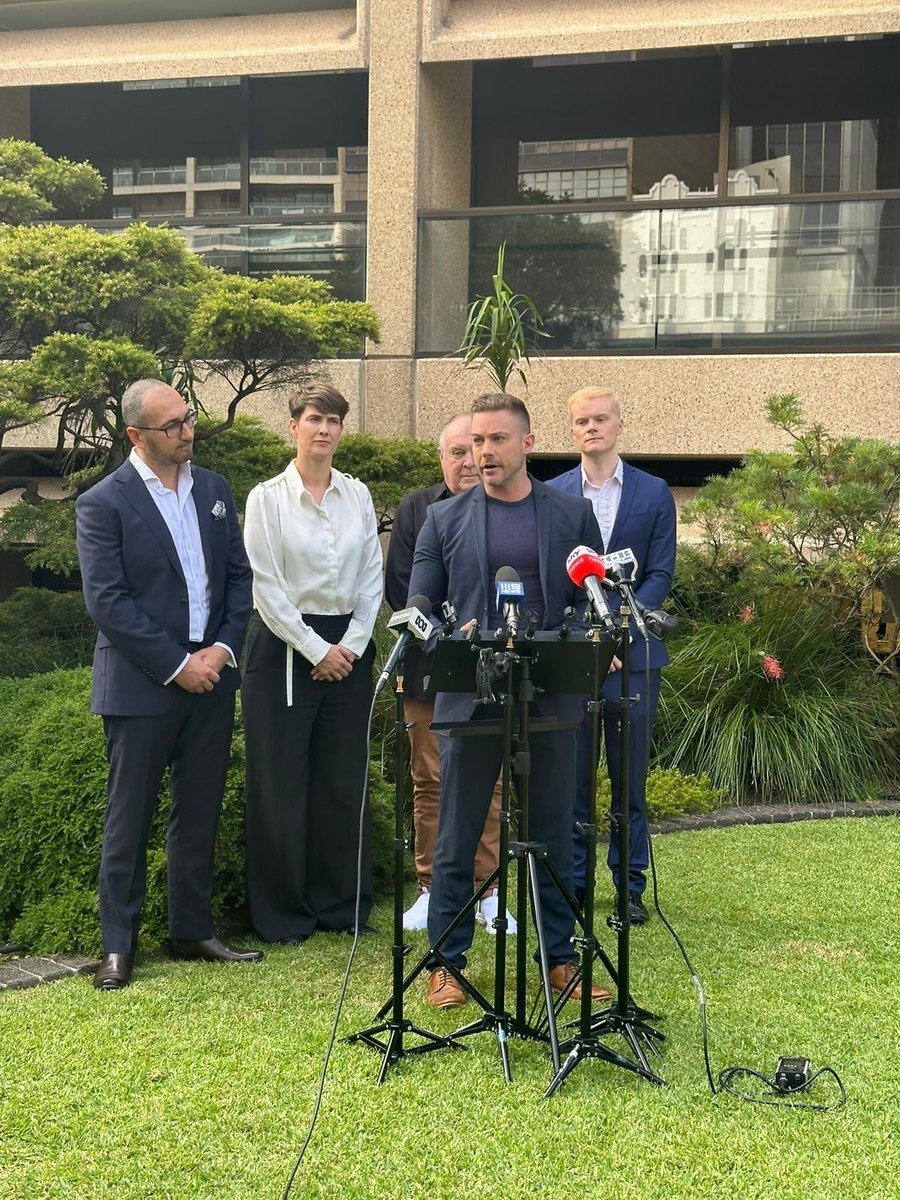 Tim Pocock speaking at a press conference in NSW advocating against conversion therapy.