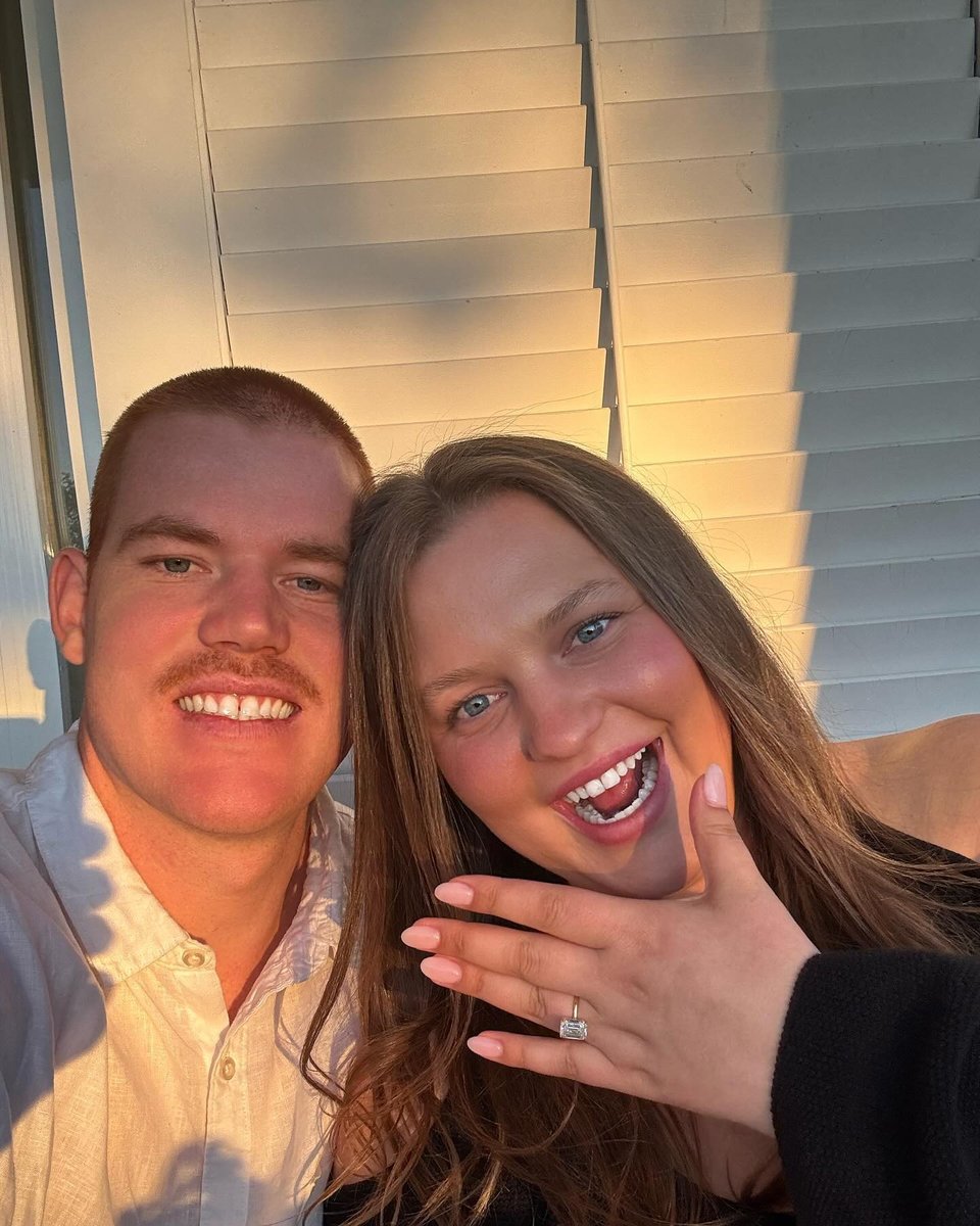 wag-chloe-pink-toby-pink-afl-player-engaged