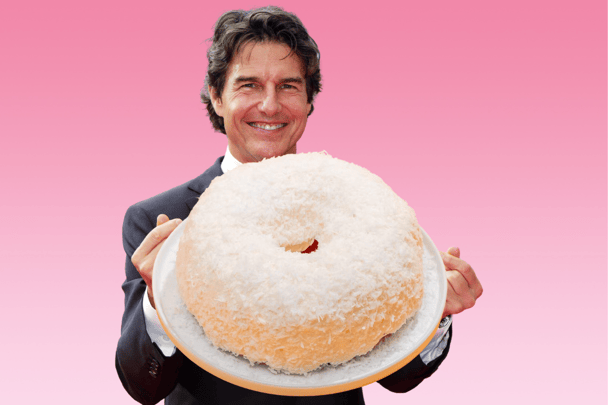 This photoshopped image shows Tom Cruise holding a coconut bundt cake.