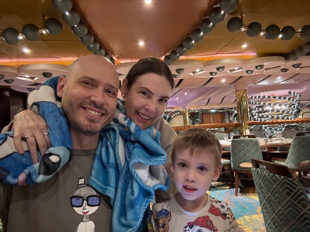An image of Tracey Jewel and her husband Nathan Constable and son Frankie on a naurodivergent cruise.
