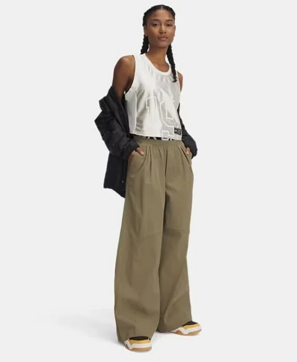 woman wearing wide leg parachute pants from Under Armour