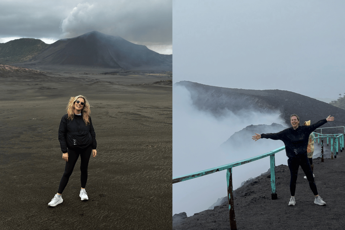 woman standing next to Yasur active volcano Vanuatu