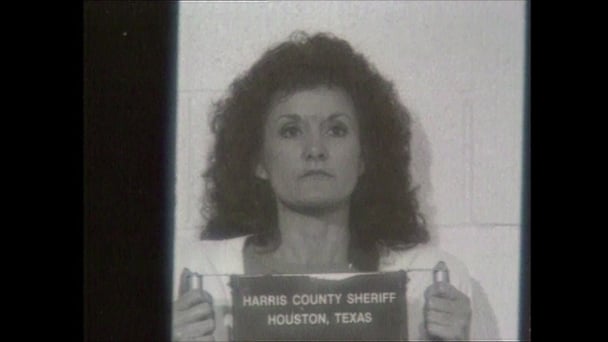 A black and white mugshot of Wanda Holloway after she was arrested and charged with solicitation of capital murder.