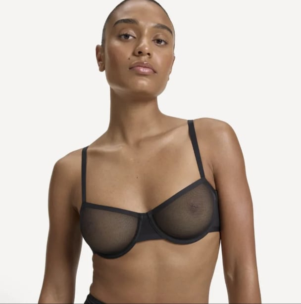 woman wearing black mesh bra from Nala