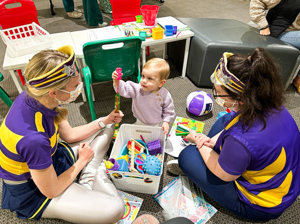 Mia Rose playing with Captain Starlight in hospital.