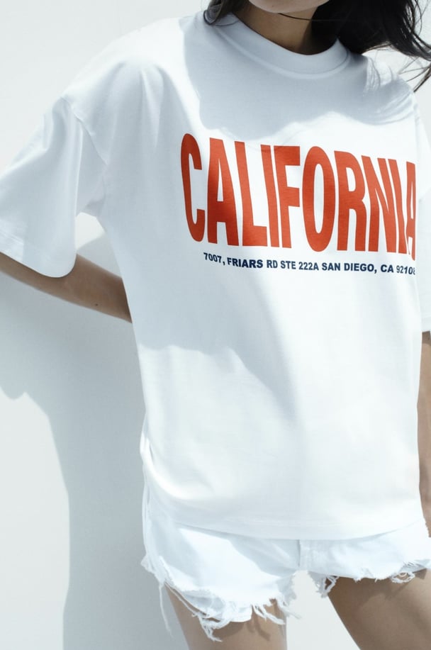 woman wearing California graphic tee from Zara